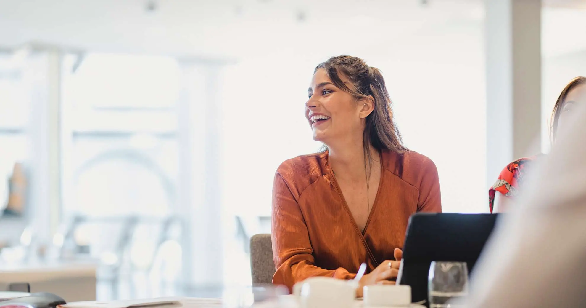 woman_in_office_smiling